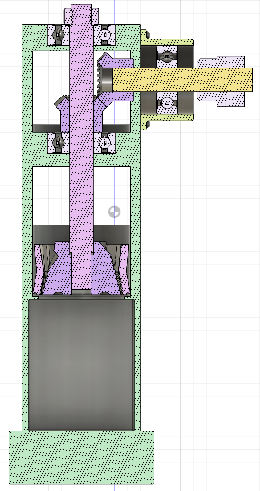 Section view of CAD assembly showing internal shaft stack, miter gear mesh, bearing seats, and burr alignment