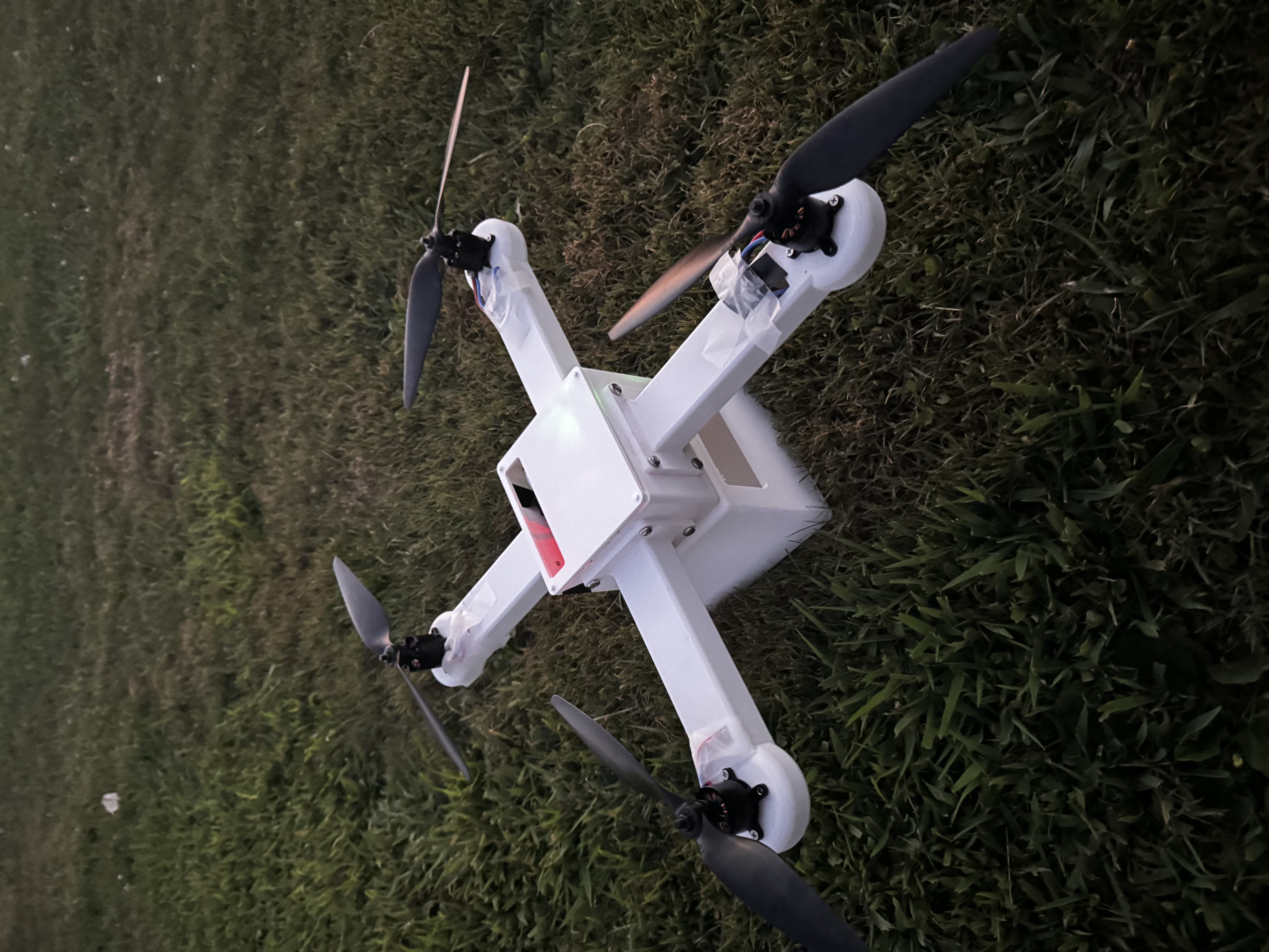 Fully assembled 3D printed quadcopter in grass