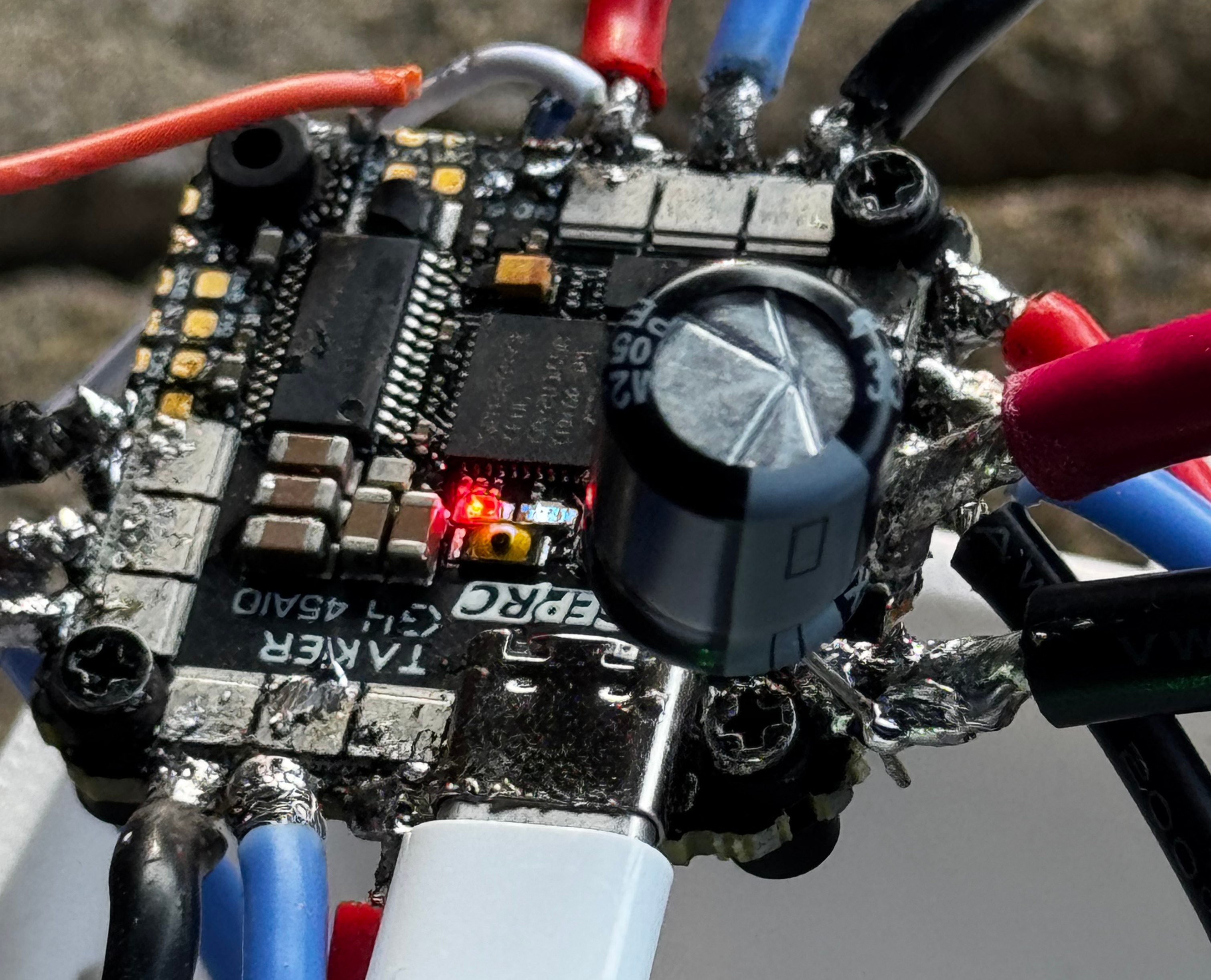 TAKER G4 AIO flight controller with soldered connections